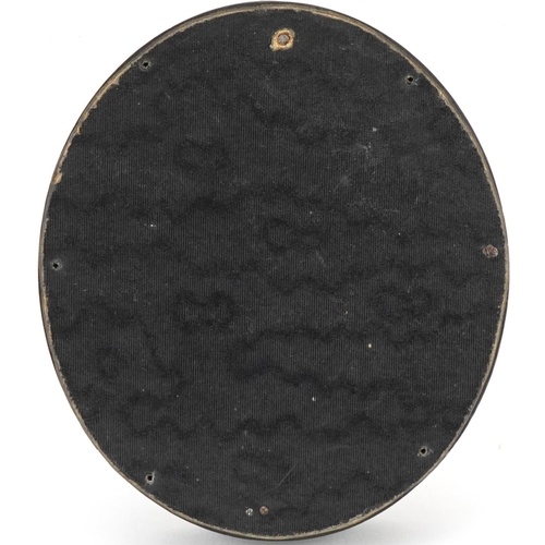 79 - Early 19th century oval miniature portrait of a young man, watercolour on board within an ebonised f... 