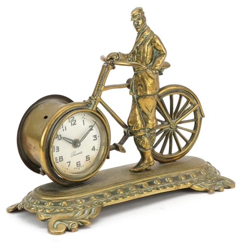 235 - Early 20th century brass desk timepiece modelled as a man with a bicycle, 16cm H x 19cm W x 9cm D