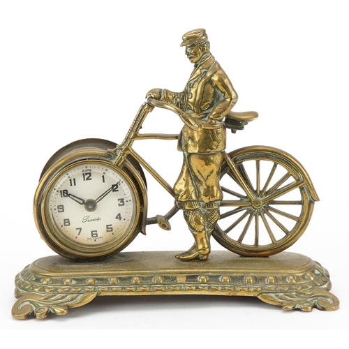 235 - Early 20th century brass desk timepiece modelled as a man with a bicycle, 16cm H x 19cm W x 9cm D