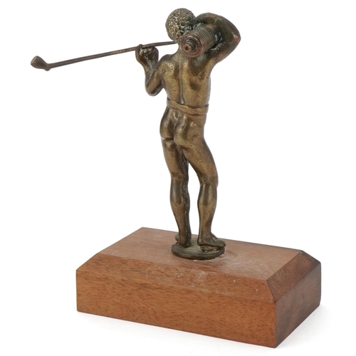 78 - Late 19th century bronze figure of a naked man smoking a pipe mounted on a later wooden base, overal... 