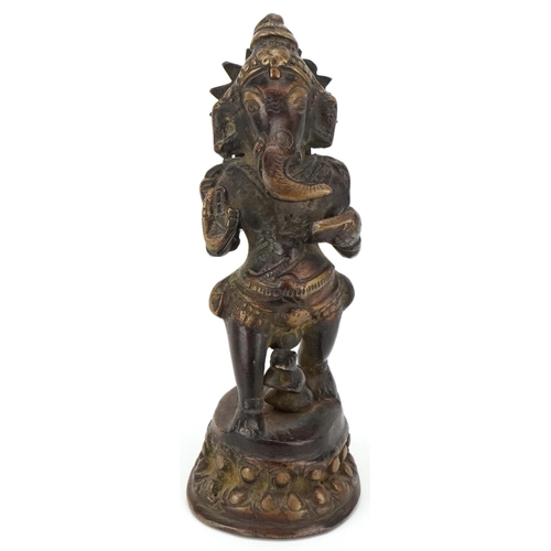 92 - Late 19th/early 20th century Indian brown patinated bronze figure of Ganesh, 14cm high