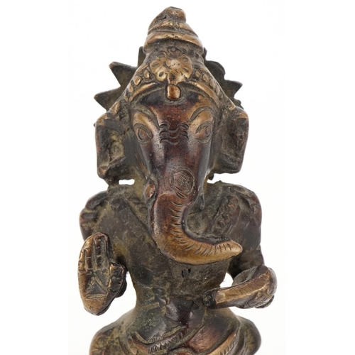 92 - Late 19th/early 20th century Indian brown patinated bronze figure of Ganesh, 14cm high