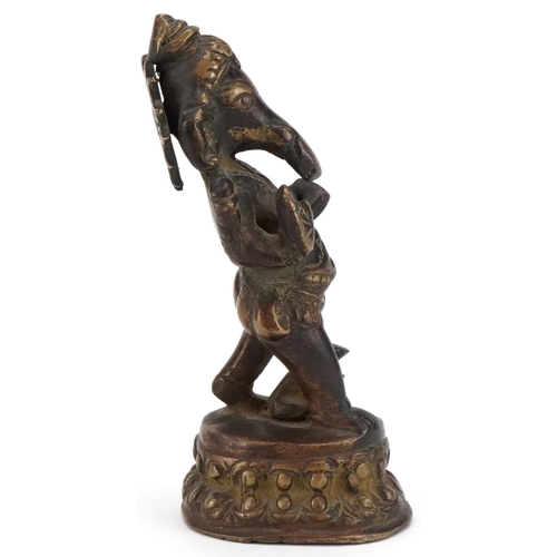 92 - Late 19th/early 20th century Indian brown patinated bronze figure of Ganesh, 14cm high