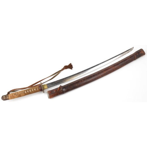 2727 - World War II period Japanese katana with curved single-edged blade, with cord-bound shark skin cover... 