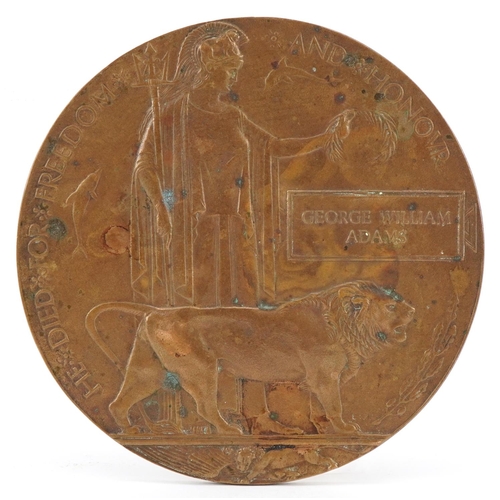 2538 - World War I bronze death plaque in honour of George William Adams, 12cm in diameter