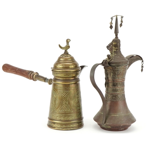 241 - Two early 20th century Islamic brass and copper jugs, each with embossed decoration, the largest 26c... 