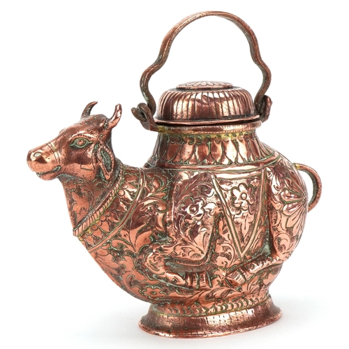 242 - Early 20th century Indian copper teapot in the form of a bull with embossed decoration and swing han... 