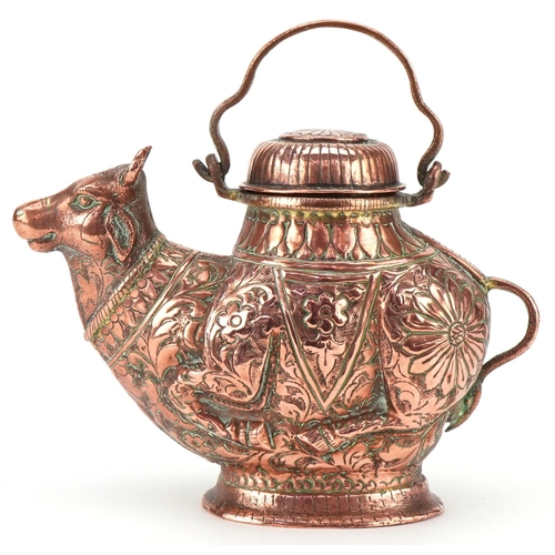 242 - Early 20th century Indian copper teapot in the form of a bull with embossed decoration and swing han... 