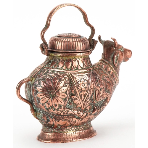 242 - Early 20th century Indian copper teapot in the form of a bull with embossed decoration and swing han... 