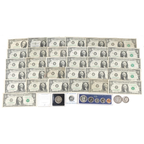 2234 - Thirty American one dollar notes, ten dollar note and four silver American coins including Morgan do... 