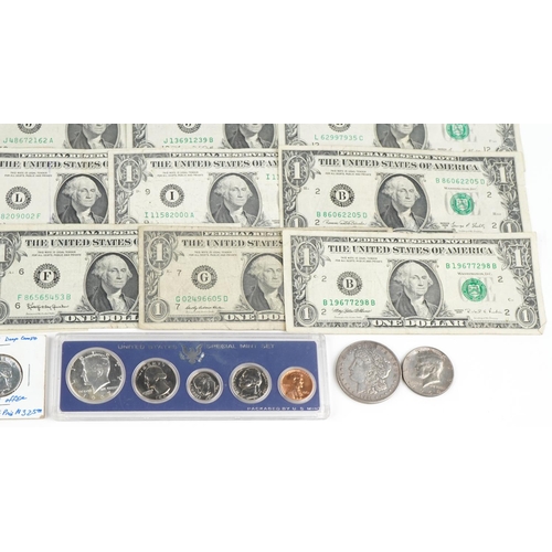 2234 - Thirty American one dollar notes, ten dollar note and four silver American coins including Morgan do... 