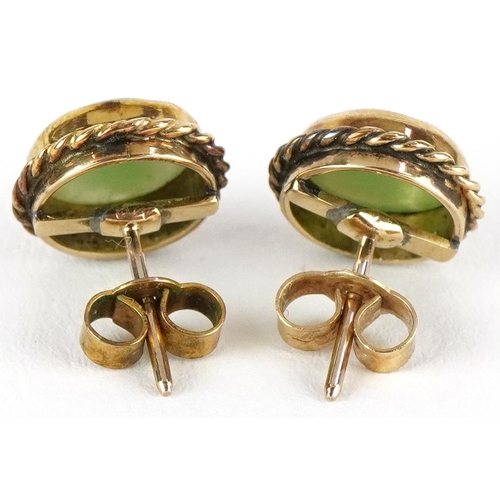 3249 - Pair of unmarked gold cabochon green jade earrings, 10.5mm in diameter, total 2.3g