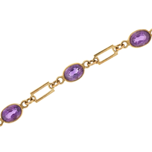 3031 - 9ct gold bracelet set with six facetted amethysts, 16cm in length, 6.2g