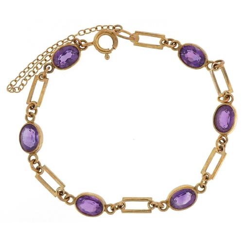 3031 - 9ct gold bracelet set with six facetted amethysts, 16cm in length, 6.2g