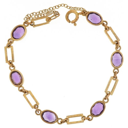 3031 - 9ct gold bracelet set with six facetted amethysts, 16cm in length, 6.2g