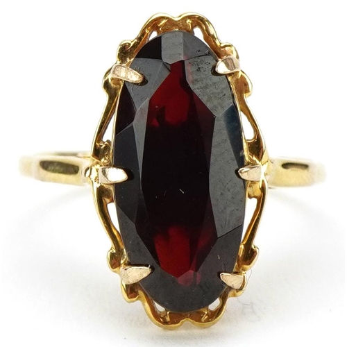 3295 - 9ct gold garnet ring, the garnet 14.95mm x 7.15mm, size J, 2.5g