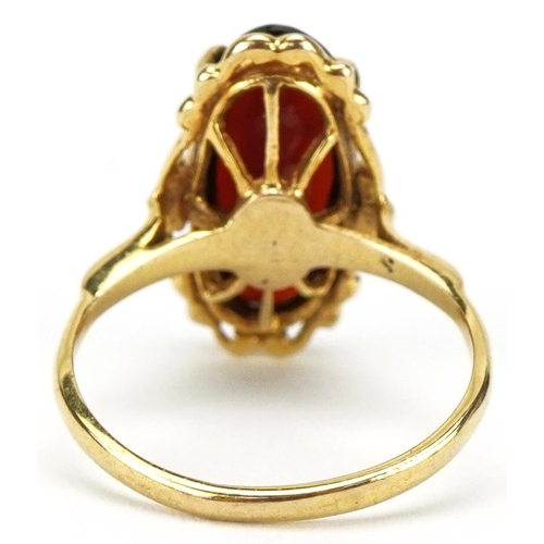 3295 - 9ct gold garnet ring, the garnet 14.95mm x 7.15mm, size J, 2.5g