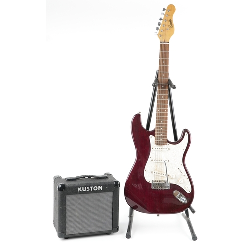 617 - Encore Stratocaster six string electric guitar in red together with a Kuston practice amplifier