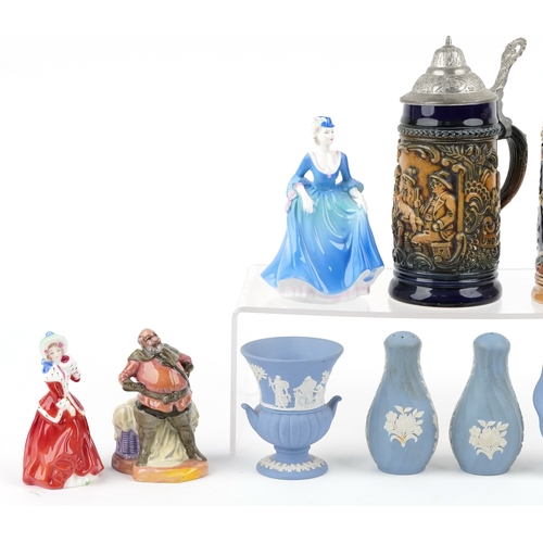 523 - Three Royal Doulton figure, five Wedgwood Jasperware items and two German tankards.