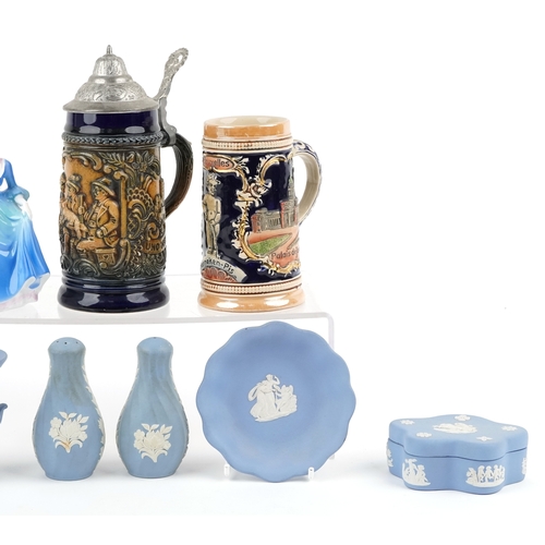 523 - Three Royal Doulton figure, five Wedgwood Jasperware items and two German tankards.