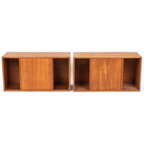 1091 - Two Ladderax teak shelving cabinets, each with sliding doors (lacking support bars), 47cm H x 89cm W... 