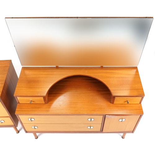 1061 - Late 20th century golden teak veneered dressing table and matching chest of three drawers, the dress... 