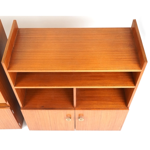 1060 - Three late 20th century teak veneered shelving units, the largest two units 98cm H x 82cm W x 38cm D