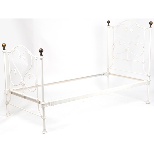 1095 - Victorian style white painted cast and wrought iron single bed frame with brass finials, H-126cm W-9... 