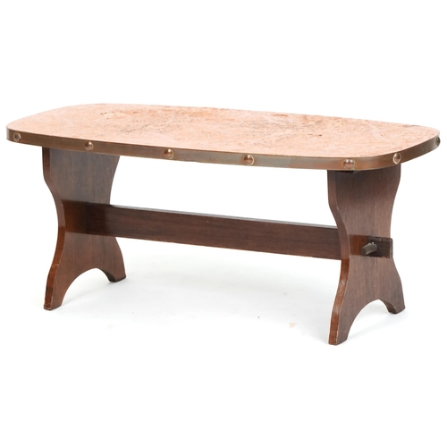 1090 - Mid 20th century Arts & Crafts style copperwork coffee table raised on oak supports, 39cm H x 90cm W... 