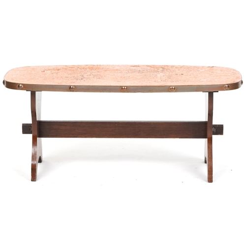 1090 - Mid 20th century Arts & Crafts style copperwork coffee table raised on oak supports, 39cm H x 90cm W... 