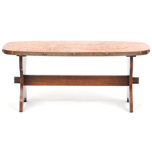 1090 - Mid 20th century Arts & Crafts style copperwork coffee table raised on oak supports, 39cm H x 90cm W... 