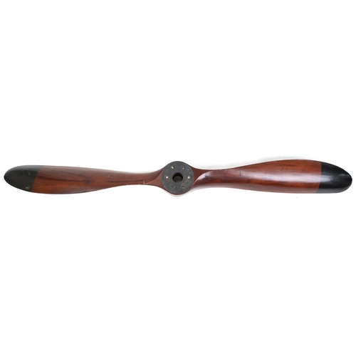 1118 - 20th century mahogany propeller with black painted tips, 203cm in length