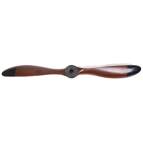 1118 - 20th century mahogany propeller with black painted tips, 203cm in length