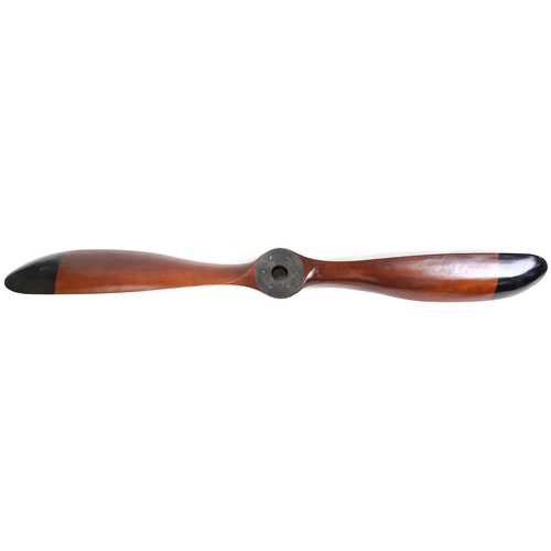 1117 - 20th century mahogany propeller with black painted tips, 203cm in length