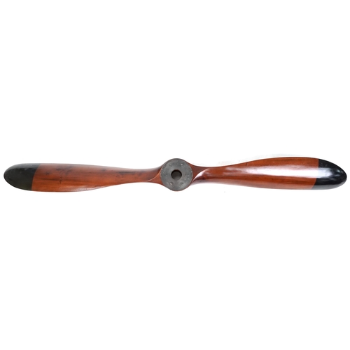 1117 - 20th century mahogany propeller with black painted tips, 203cm in length