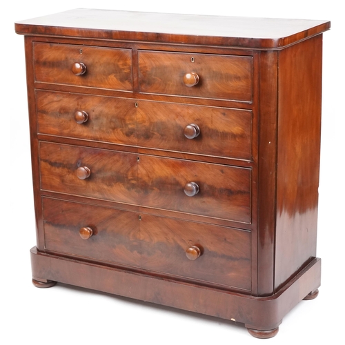 1008 - Victorian figured mahogany chest of two short and three long drawers on bun feet, 117cm H x 120cm W ... 