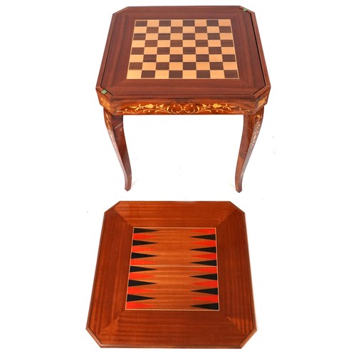 1030 - Late 20th century Sorrento style walnut games table, the reversible top raised on cabriole legs, 75c... 