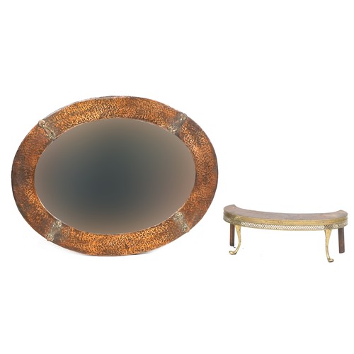 1032 - Arts & Crafts copper framed oval mirror with hammered decoration, 76cm x 59cm, together with an earl... 