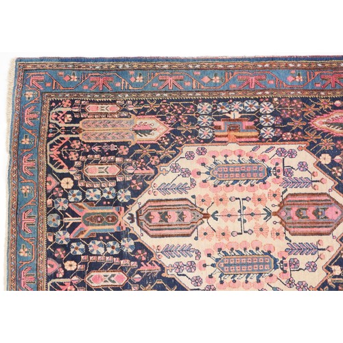 1017 - Afshar rug, South West Persia, early 20th century, the midnight blue field with a stepped medallion ... 