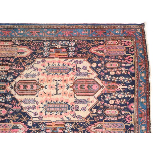 1017 - Afshar rug, South West Persia, early 20th century, the midnight blue field with a stepped medallion ... 