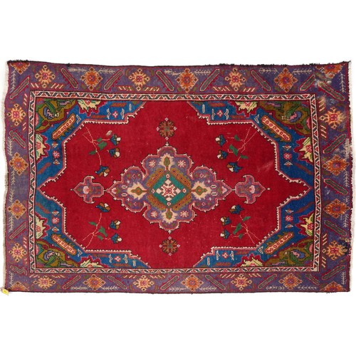 1019 - Ghashghai rug, South West Persia, mid 20th century, the red field with a central pink medallion supp... 