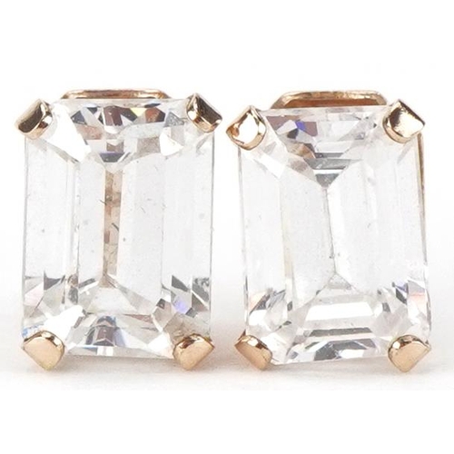 3327 - Pair of 9ct gold clear stone stud earrings, each 7mm high, total 1.1g