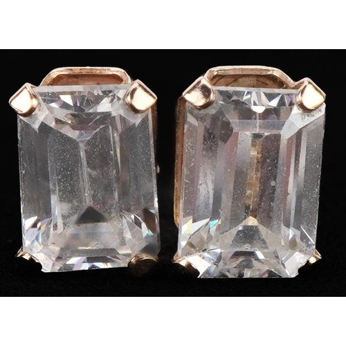 3327 - Pair of 9ct gold clear stone stud earrings, each 7mm high, total 1.1g