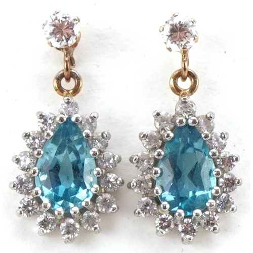 3274 - Pair of yellow metal blue topaz and clear stone teardrop earrings, each 1.8cm high, total 2.0g