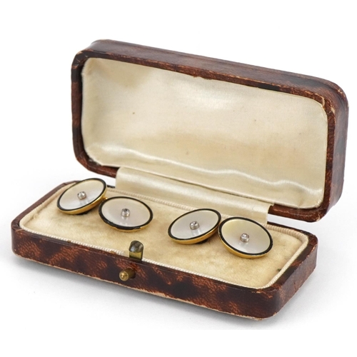 3205 - Pair of Art Deco 18ct gold, diamond, mother of pearl and black enamel cufflinks housed in a fitted c... 