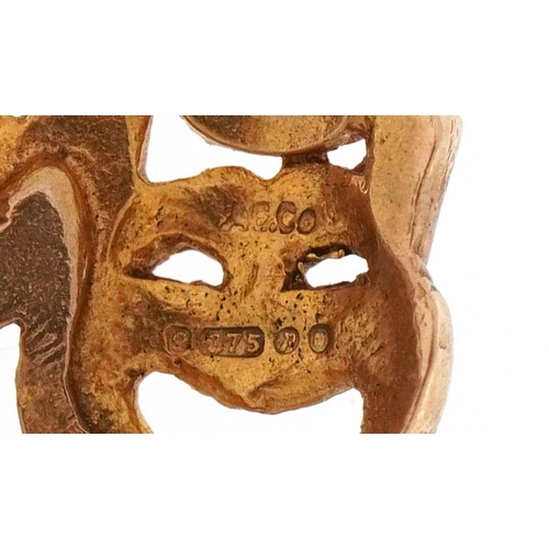 3162 - 9ct gold charm in the form of theatre masks, 1.7cm wide, 1.9g