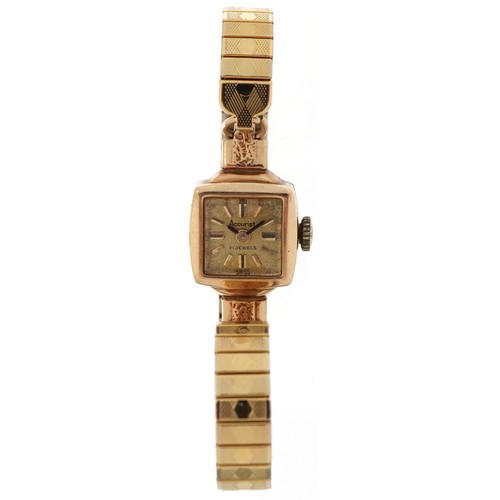 3198 - Accurist, 9ct gold cased ladies manual wind wristwatch with gold plated strap, the case 14.0mm wide,... 