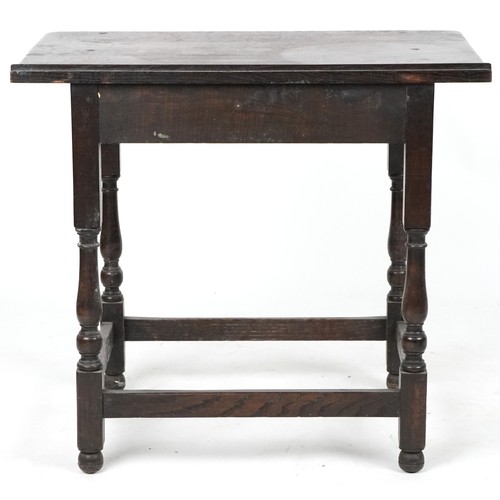 1013 - Jacobean Revival oak side table fitted with a single frieze drawer raised on turned and block legs, ... 