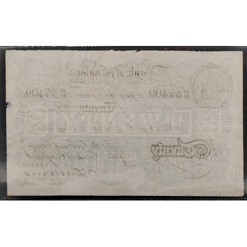 2188 - Catterns Bank of England 1932 white twenty pound note, serial number 46M35409, possibly a Bernhard W... 