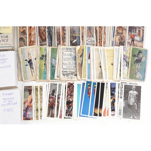 2300 - Quantity of cigarette cards, many in the original boxes, to include Virginia tobacco, Kensitas, Wood... 